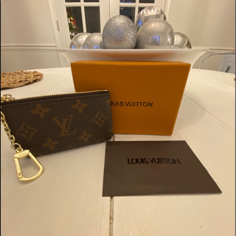 LV key pouch w box and dust bag.